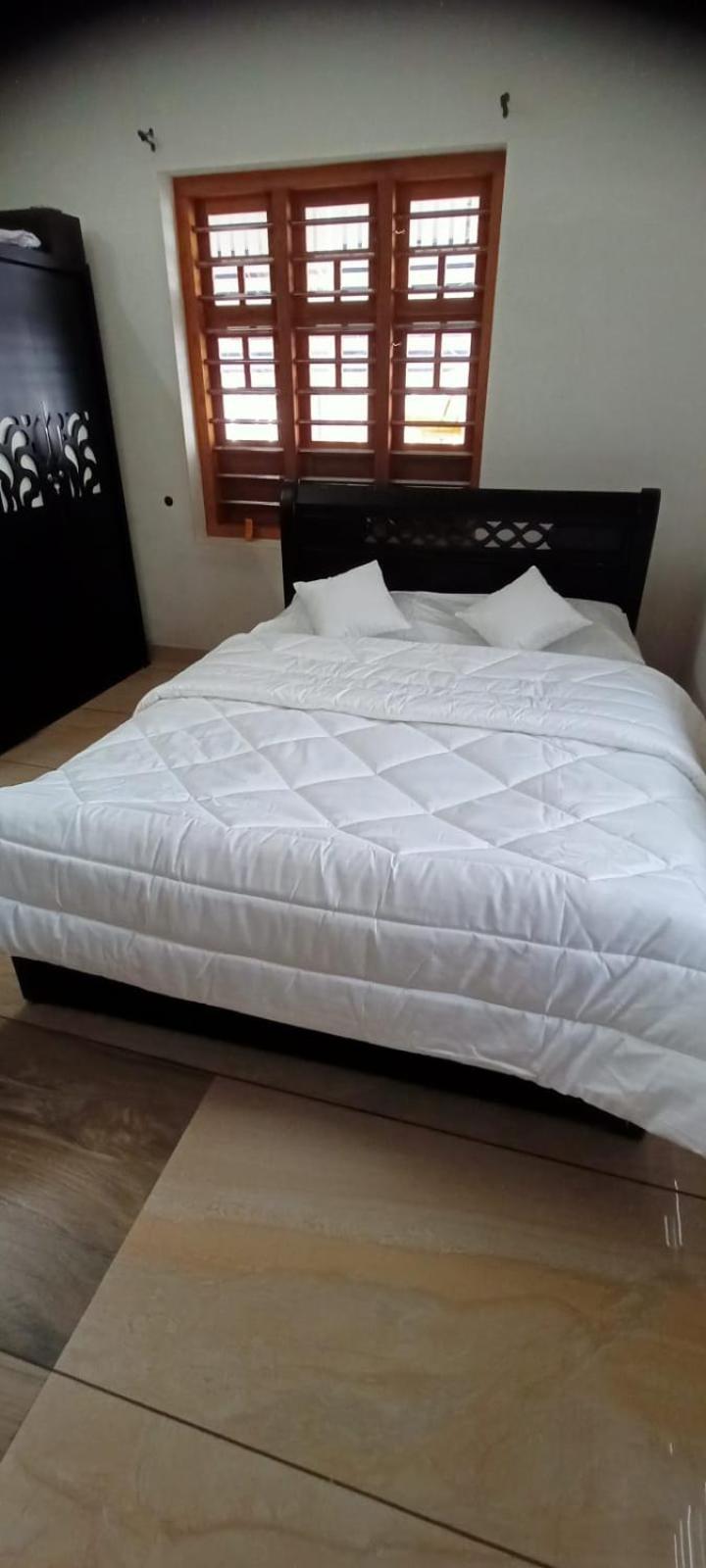 קוז'יקודה Green Island Homestay Riverside מראה חיצוני תמונה
