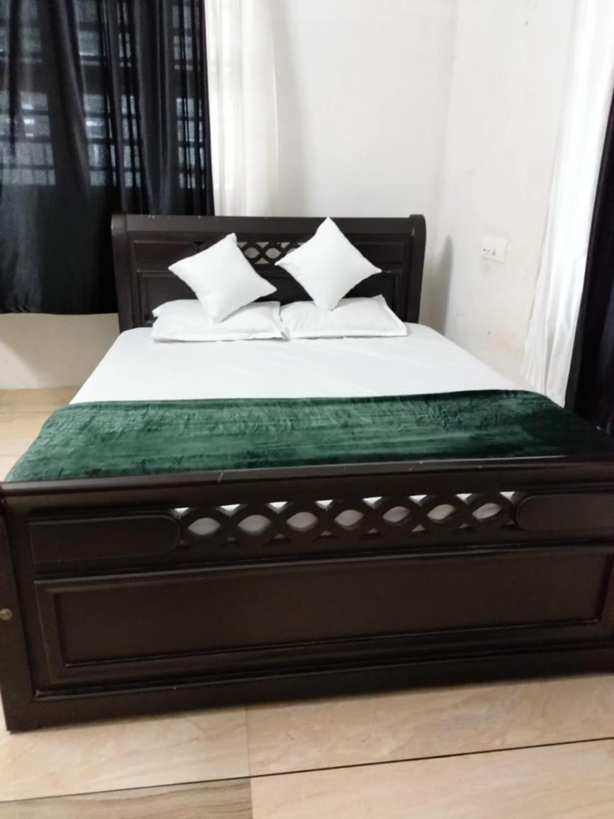 קוז'יקודה Green Island Homestay Riverside מראה חיצוני תמונה