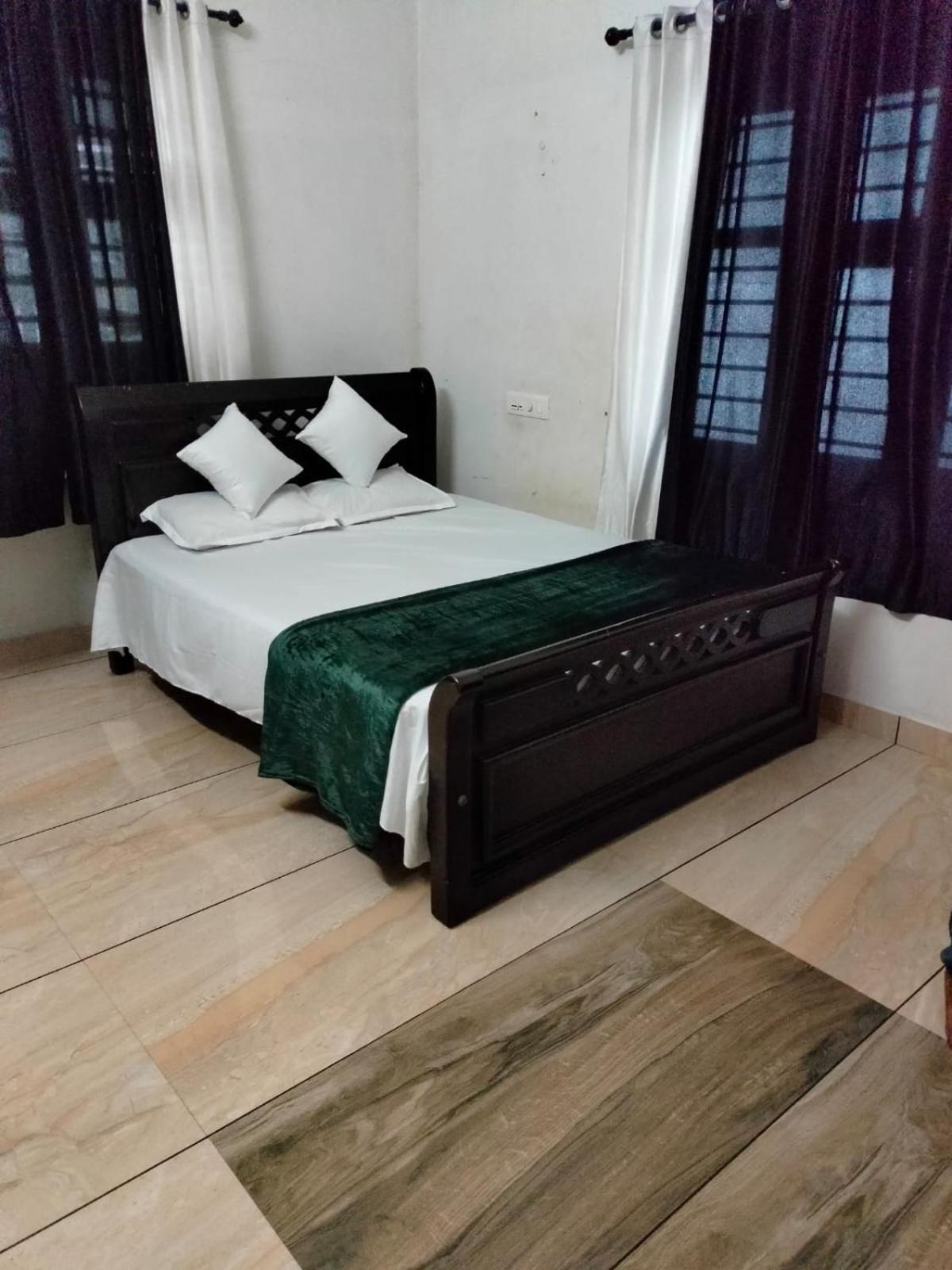 קוז'יקודה Green Island Homestay Riverside מראה חיצוני תמונה