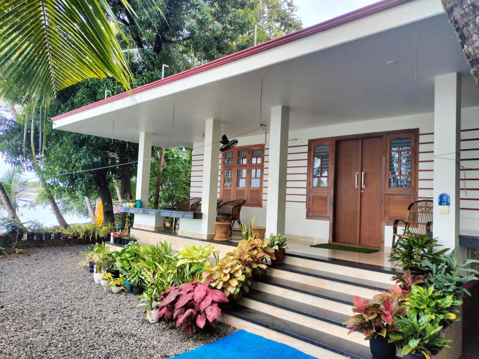 קוז'יקודה Green Island Homestay Riverside מראה חיצוני תמונה