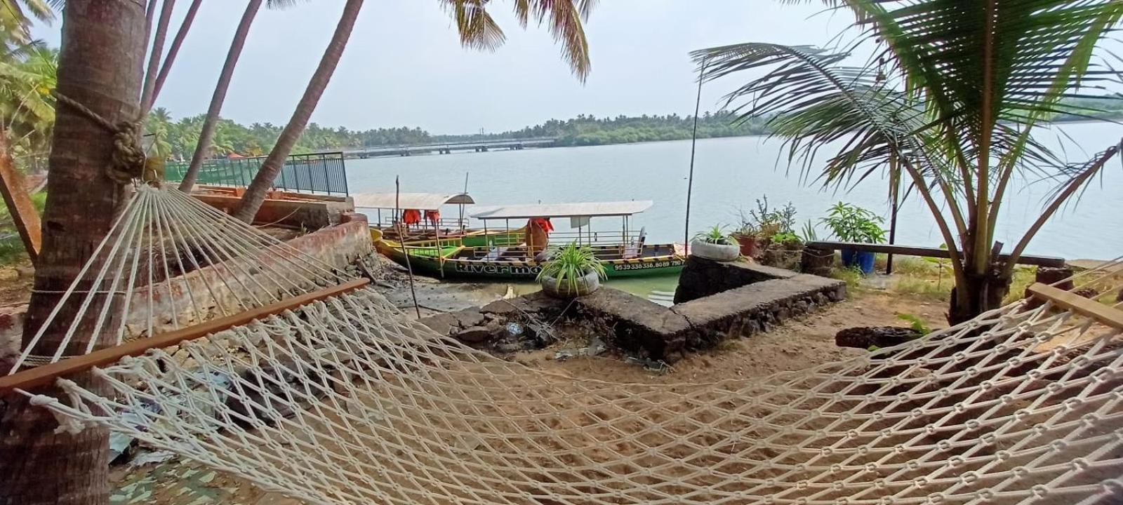 קוז'יקודה Green Island Homestay Riverside מראה חיצוני תמונה